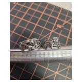 Unicorn rings 11.5 and 7.5 larger is marked 925