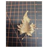 Large golden colored trifari leaf broach
