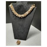 Gold tone leaf necklace & Clip on earrings marked