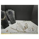 Assorted gold toned jewelry Necklaces, ring,
