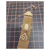 Gold Victorian ribbon chain watch fob?