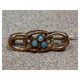 Gold opal pin