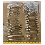 Lot of 28 matching satin/ brushed nickel cabinet