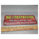 "No Trespassing" metal sign