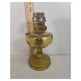 Aladdin model E lamp amber glass