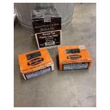 2 boxes black trim nails, partial box plastic cap