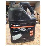 Partial bottle Echo bar oil approx. 3.5qt.