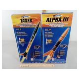 2 Estes Rockets, 1-Taser, 2-Alpha III, with 2