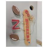 Wooden huskers sign