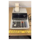 Sharp electronic adding machine, works