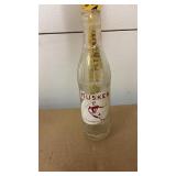 Vintage Husker soda pop bottle, bottled by