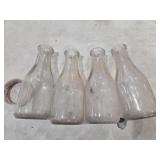Glass milk bottles