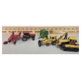 Ertl diecast tractors and implements, Ford Deere,