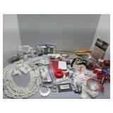 Assortment of crafting supplies, buttons, sewing,