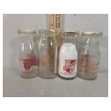 Half pint glass advertising milk bottles