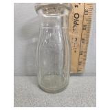 5c universal store bottle embossed half pint