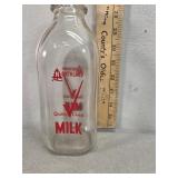 Northland Milk, color label quart glass milk