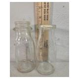 Half pint glas embossed milk bottles, Goodrich