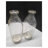 2 Meadow Gold 1qt milk bottle