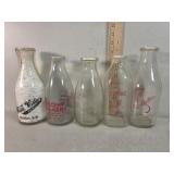 NM quart glass milk bottles, Crescent