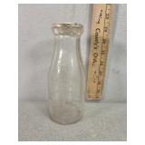 Woods dairy Hopewell VA. Embossed glass pint milk