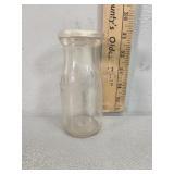 Sunray dairy embossed half pint glass milk bottle
