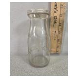Lincoln dairy, embossed half pint milk bottle