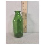 Green quart glass milk bottle