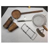 Various antiques, bee smoker, food chopper,
