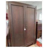 > Large wood wardrobe cabinet