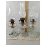 3 glass oil lamps