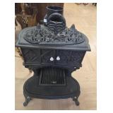 > Small cast iron stove