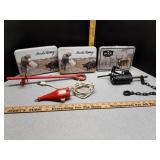 Uncle Henry & Buck Knives empty tins, ground