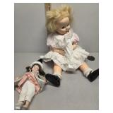 Dolls, one porcelain