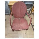 Red clam shell patio chair