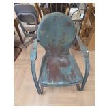 Green clam shell patio chair