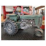 > Model green tractor