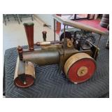 > Handcrafted model of a steam powered road