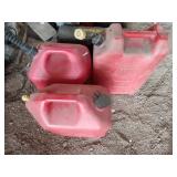 Gas Cans, 1 with 1/4 Contents