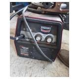 Century wire feed welder and helmet
