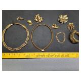 * Gold toned vintage brooches, bracelets &
