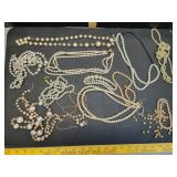 Lg lot faux pearl intact necklaces, some broken &