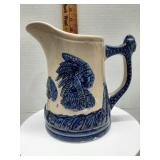 Old Sleepy Eye pottery pitcher