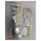3 Eisenhower dollar and 3 Kennedy half dollars