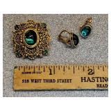 * New old stock green glass cabachon brooch &