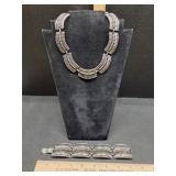 * Silver & black toned statement necklace &