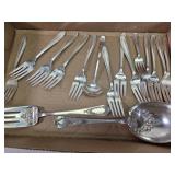 Silver foks and serving utensils
