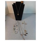 * Necklaces and earrings: T Tahari,  Trifari +