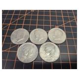 5 Kennedy half dollars