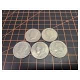 5 Kennedy half dollars